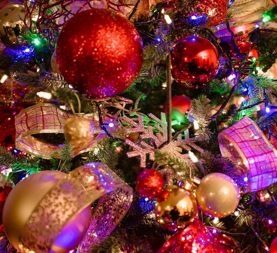 a close up of a christmas tree with ornaments